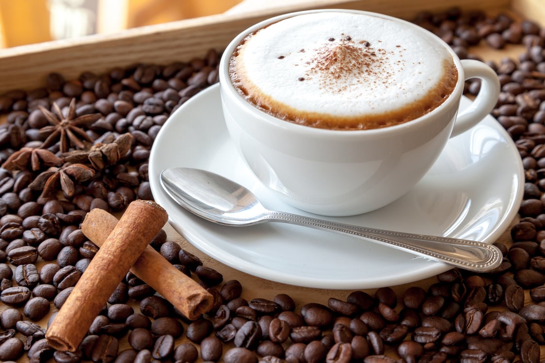 cappuccino with coffee beans